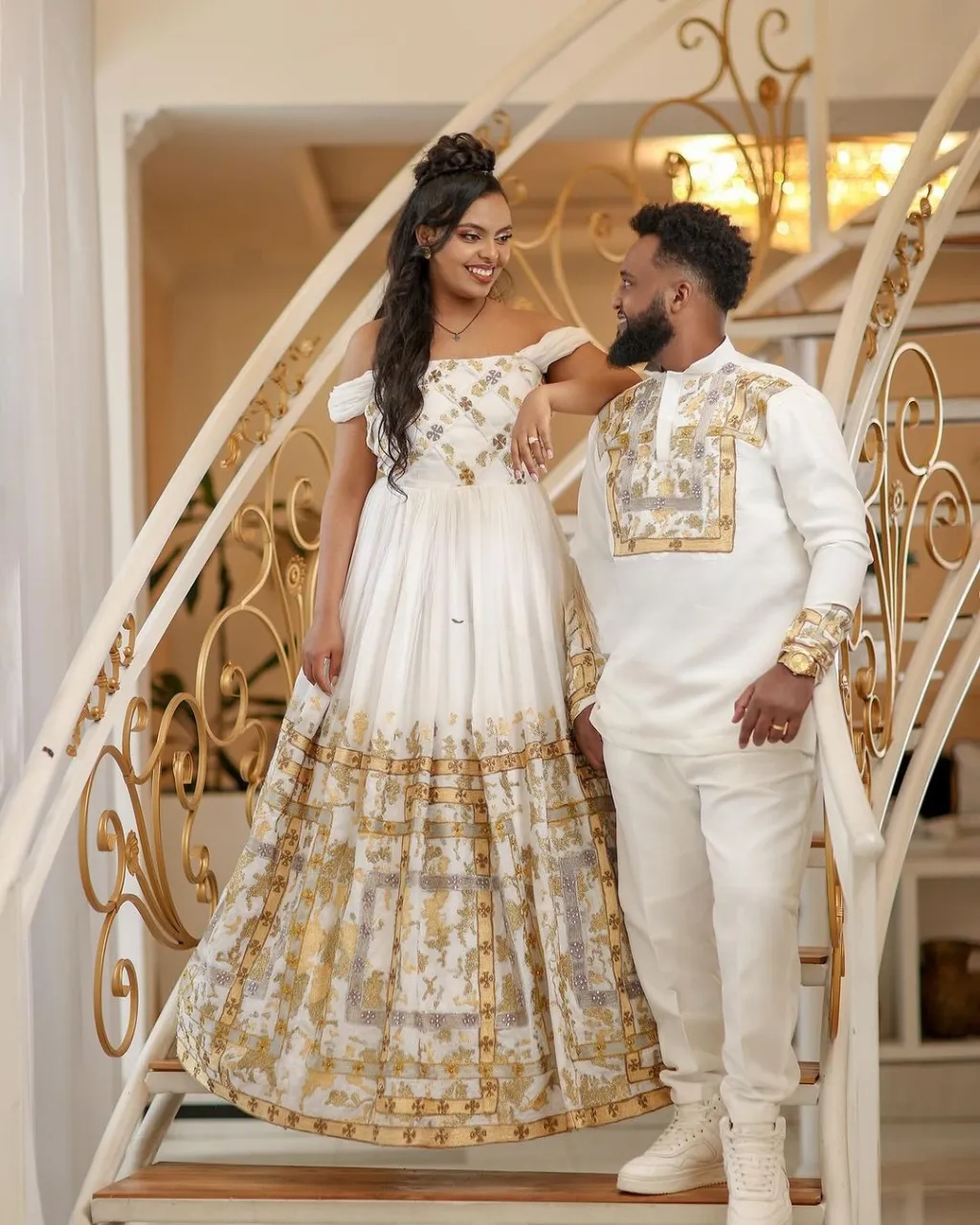 Shimmering Golden Ethiopian Traditional Couples Outfit: Elegant Look with Your Beloved in Matching Habesha Attire